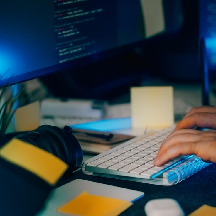 Mobile app project planning workspace with devices and development tools